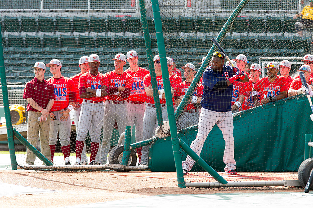 BC players watch David Oritz during batting practice. BC players watch David Oritz during batting practice.