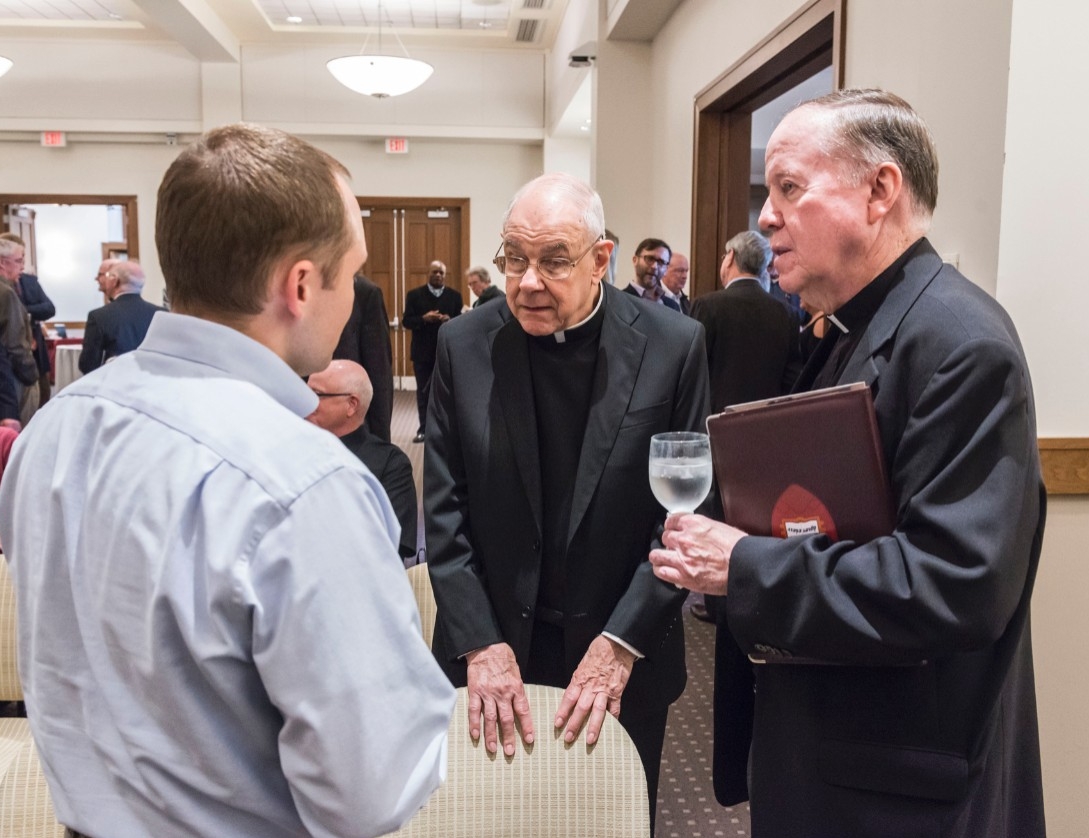 Feore Family Lecture John Padberg, S.J., and University President William P. Leahy, S.J. at the Feore Family lecture event.