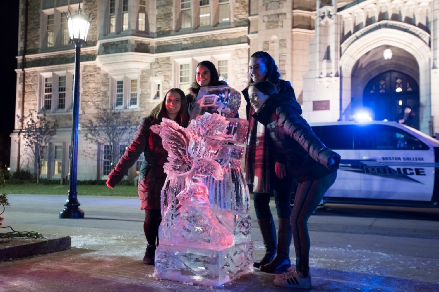 Students with an ice sculpture