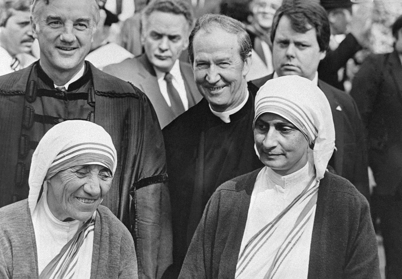 Fr. Monan with fellow honoree Mother Teresa of Calcutta and Harvard President Derek Bok at Harvard Commencement, 1982. 