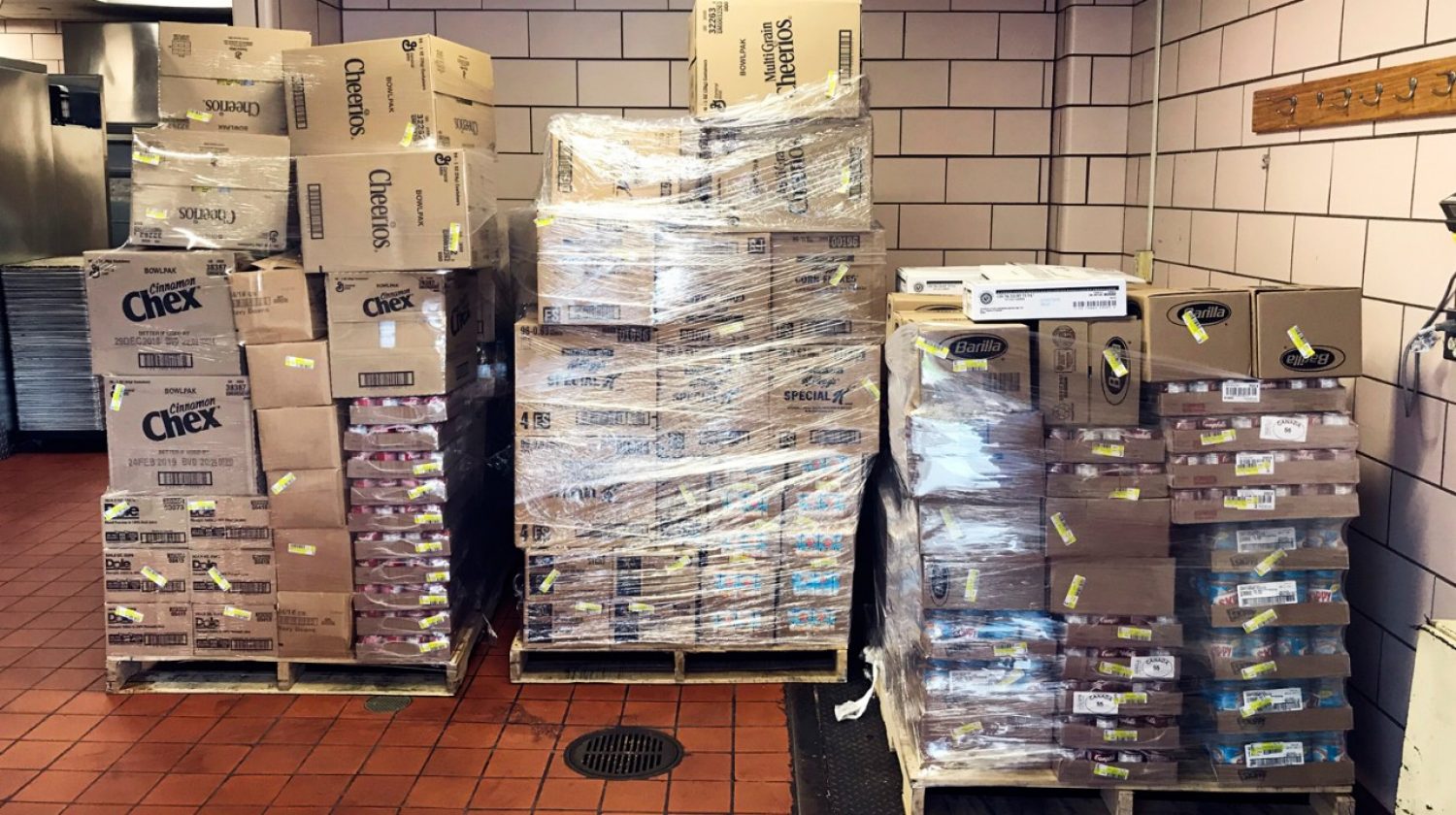 Stacks of donated food cases