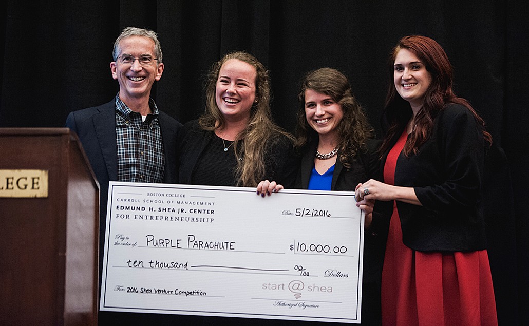 Shea Center Director Jere Doyle with Purple Parachute team Megan Greeley '16, graduate student Colleen White '17, and Christina Stellingwerf '16, winners of the top prize in the social entreprise track.