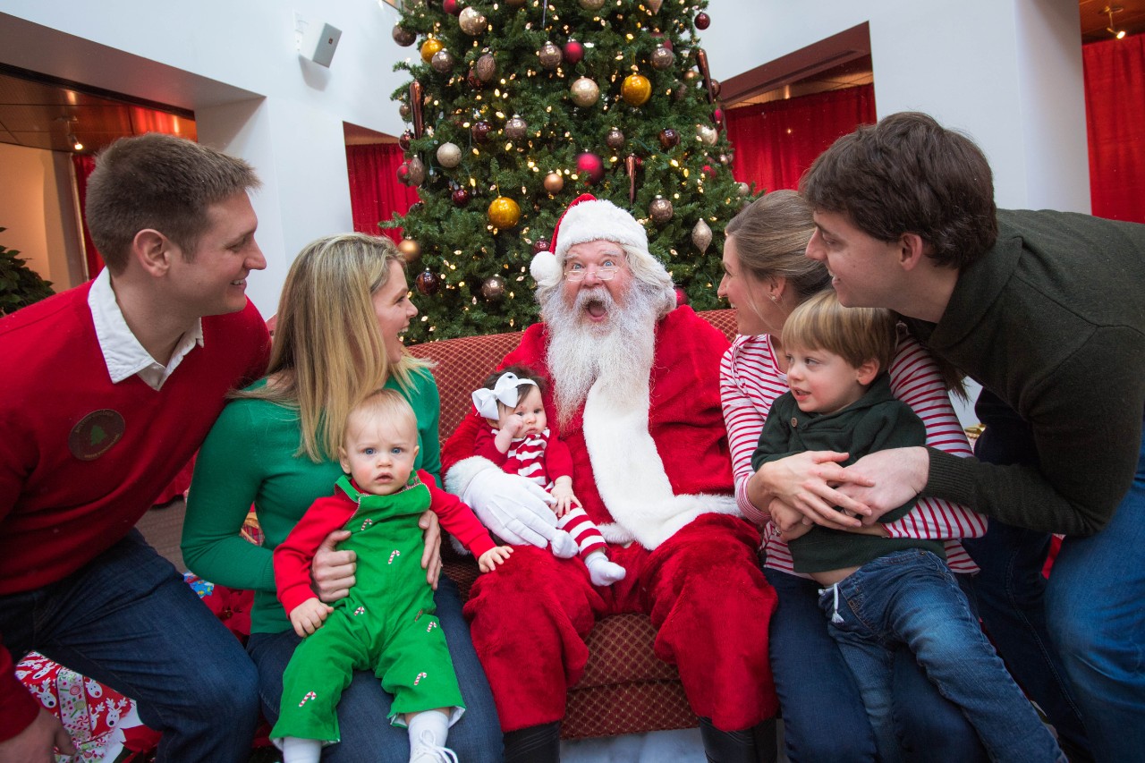 Family visiting Santa Claus.