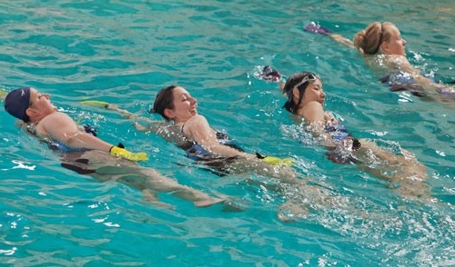 women swimming in a pool