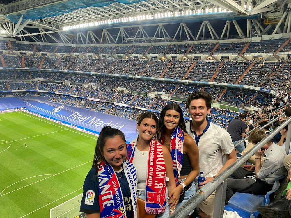 students in a soccer stadium