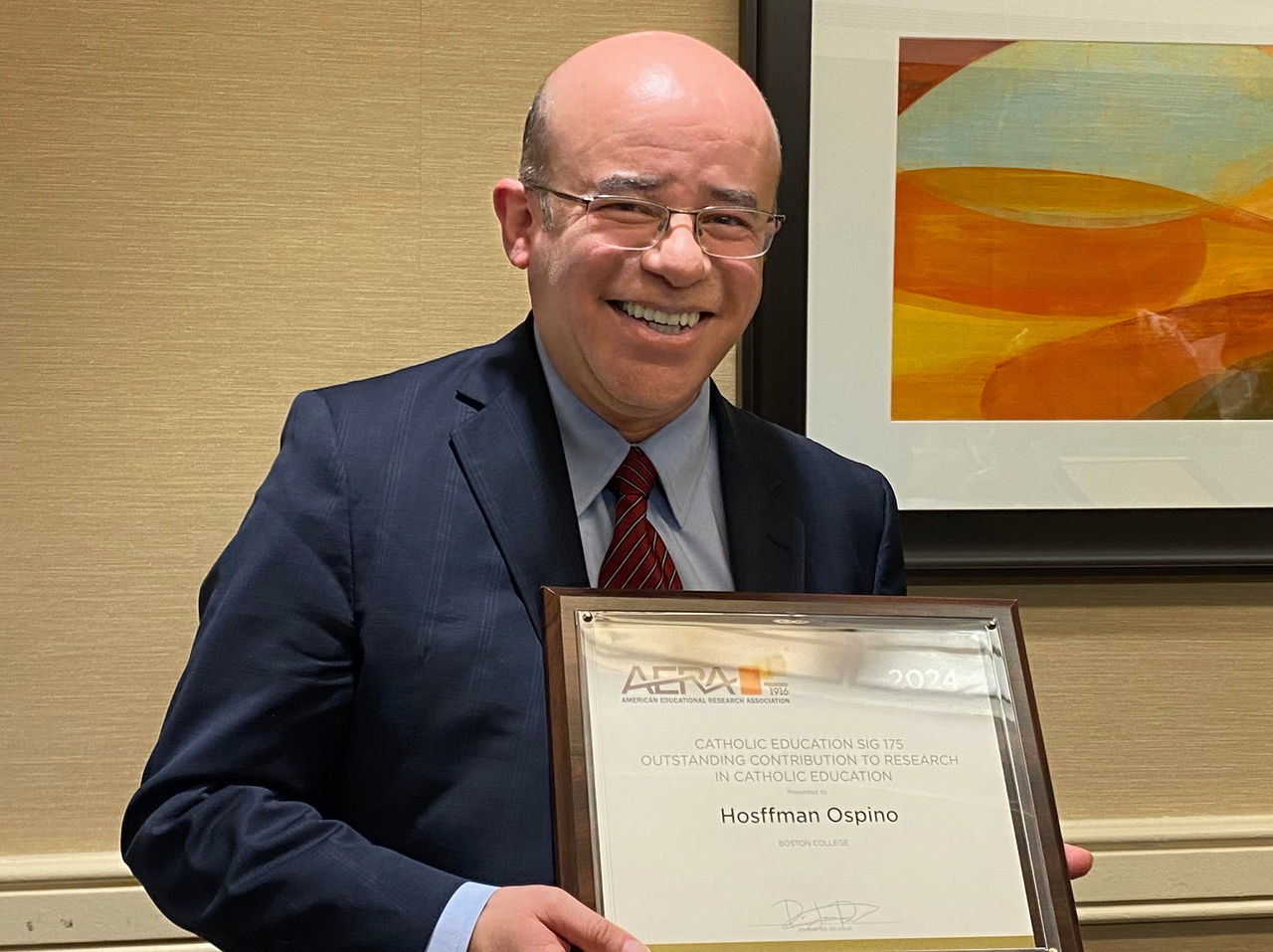 Prof. Hoffsman Ospino, and Chair of Religious Education and Pastoral Ministry (CSTM) is presented with the award for Outstanding contribution to research in Catholic education. by the American Educational Research Association..
Provided photo