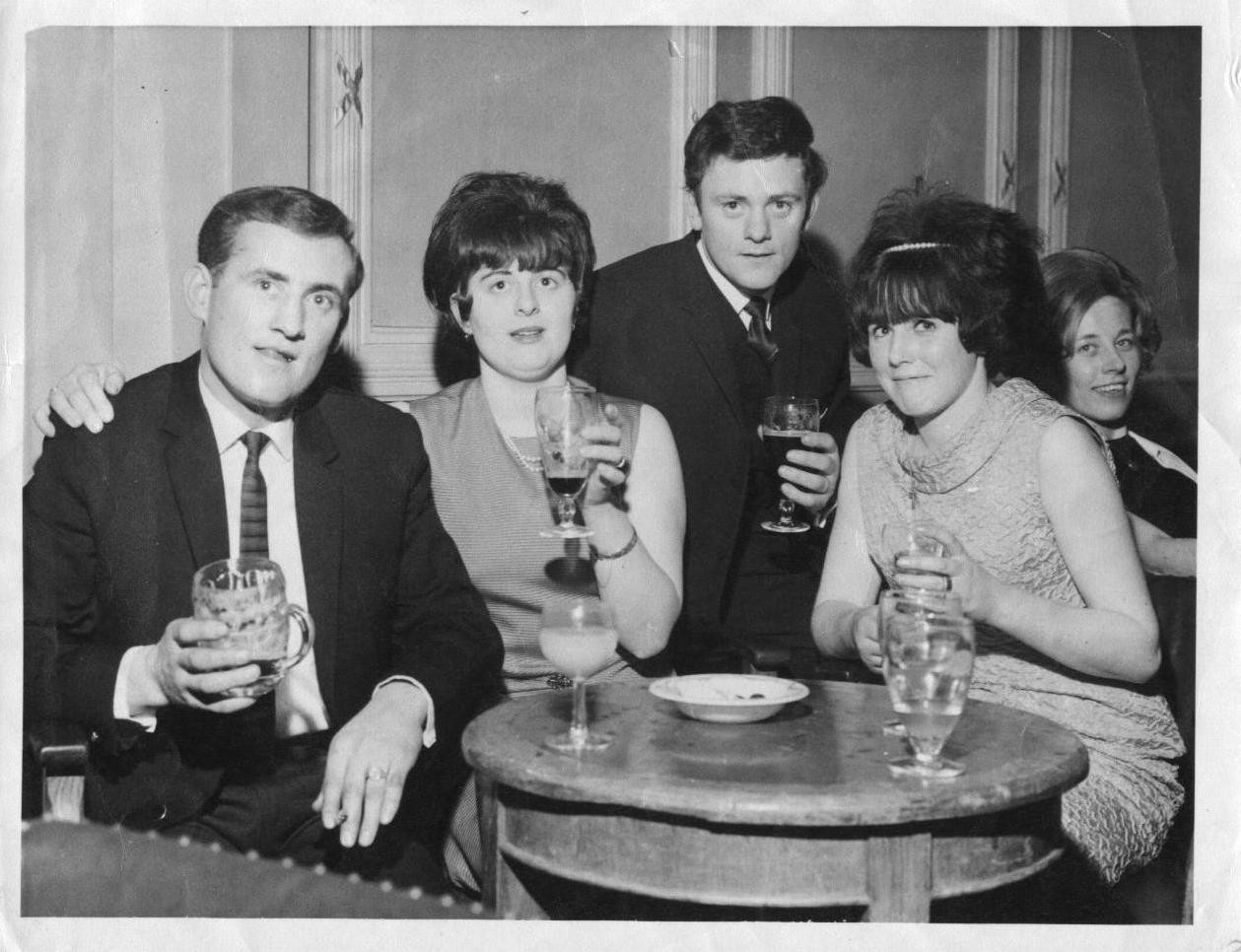 A family enjoys a dinner dance held by Brian Borus GAA Club in London in the mid-1960s. Pictured from left to right are Johnny Barrett, Joan Barrett, PJ Barrett, and Anna Barrett.