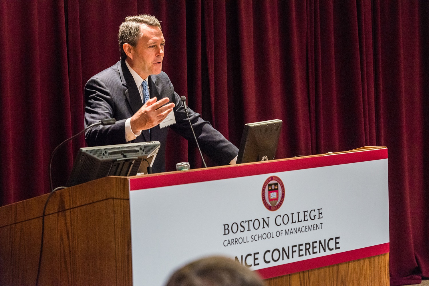 Dan Holland at the lectern at the 2016 Annual Boston College Finance Conference