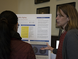 Carrie Johnson presenting a poster