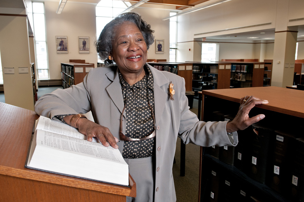 A Black woman in a library