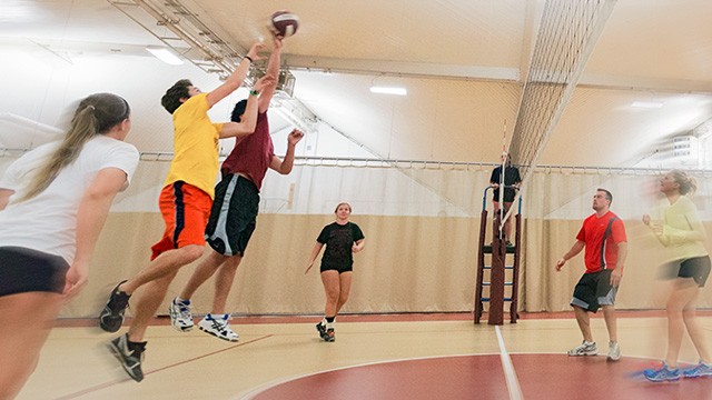 Students playing volleyball People playing volleyball