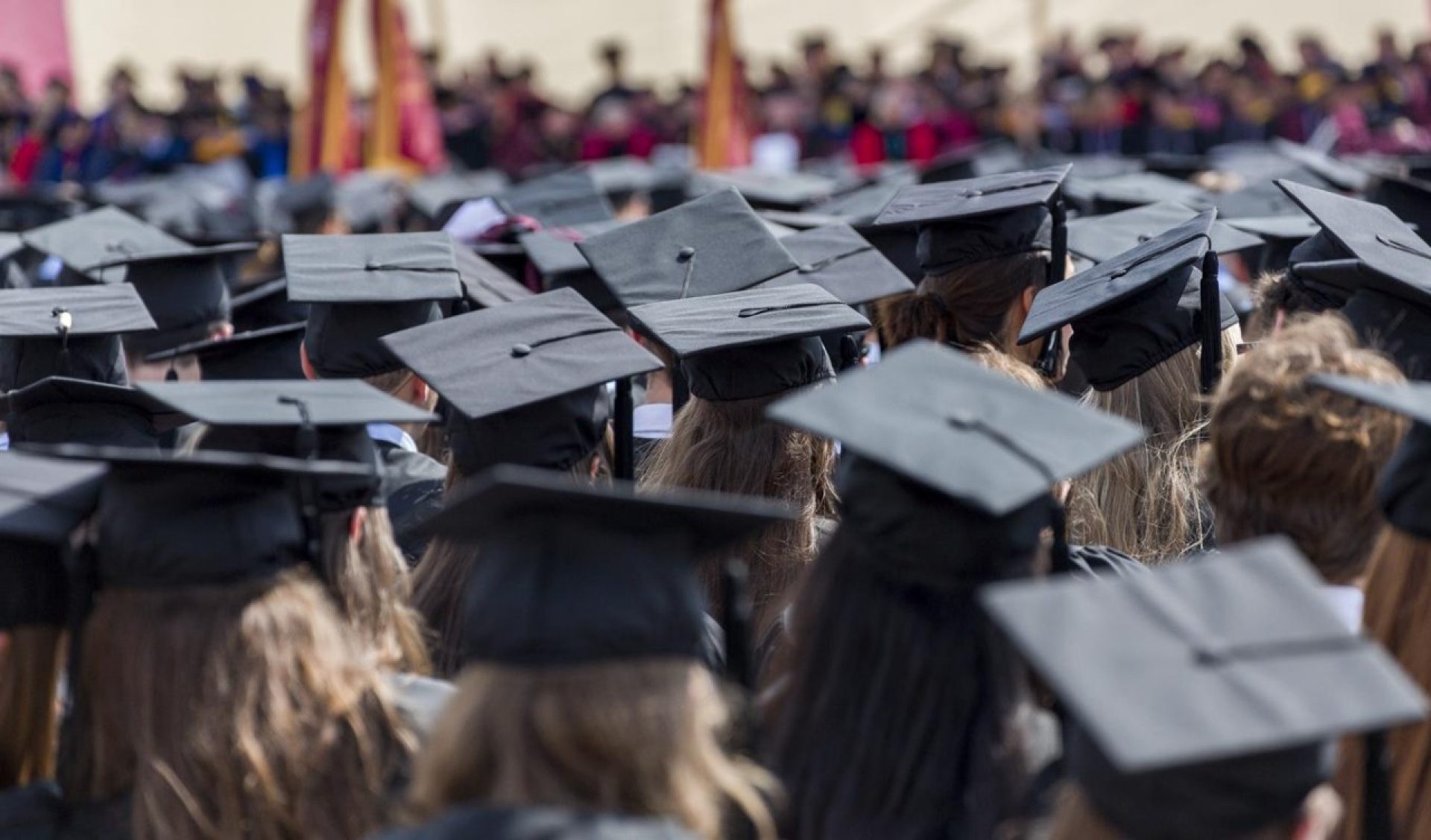 graduates at commencement