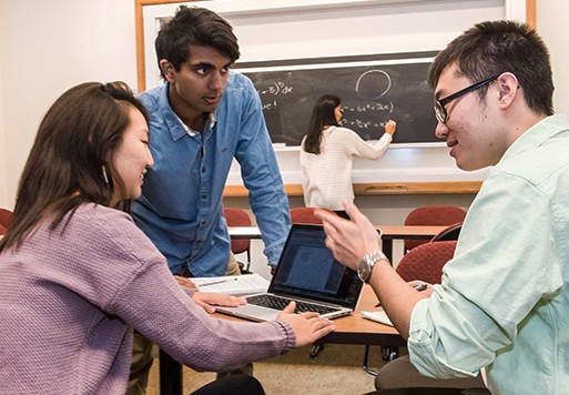 Students engaged in Woods College classroom discussion