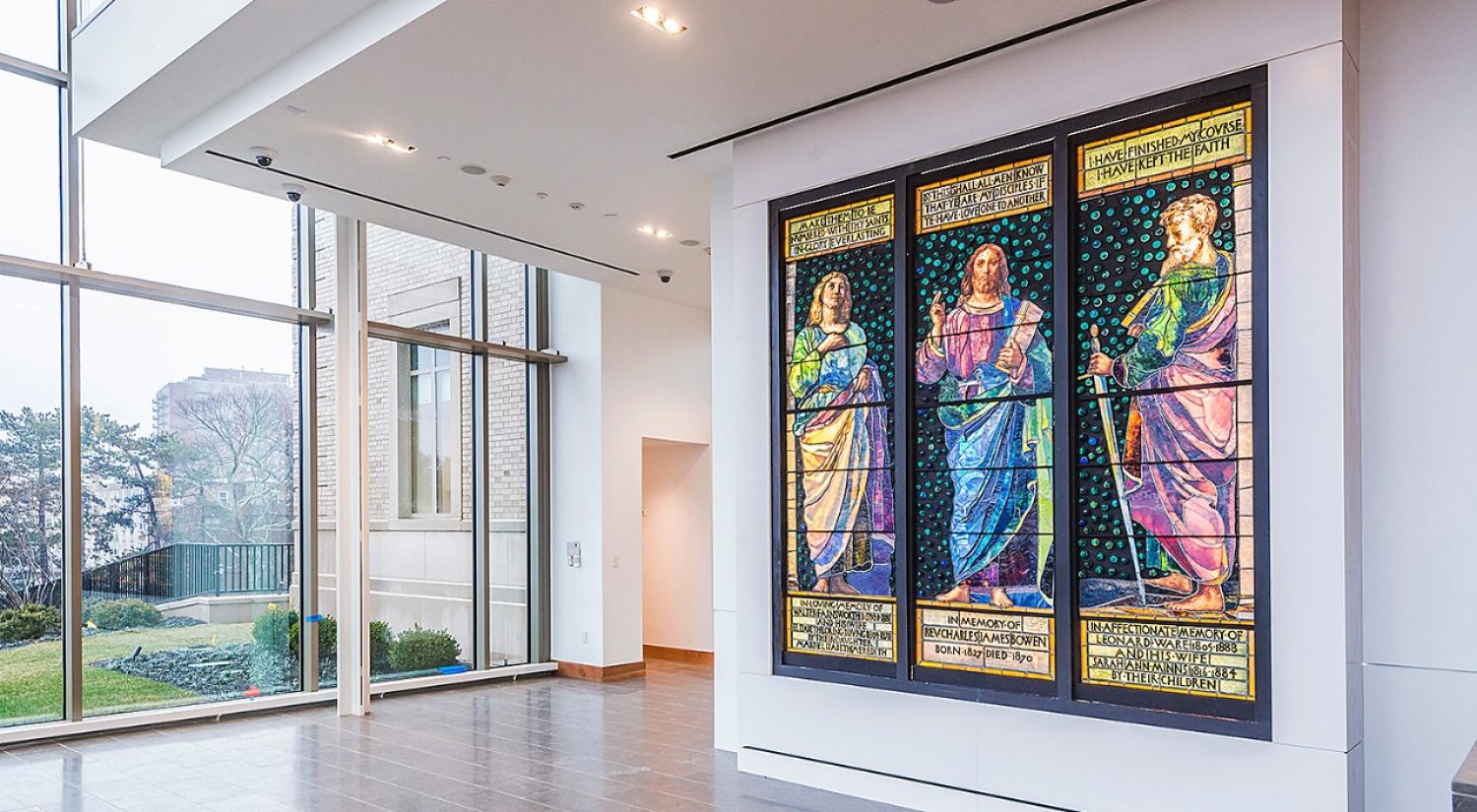 An eight-foot-tall stained-glass triptych by American artist John La Farge is the first piece to settle into the McMullen Museum of Art’s new home