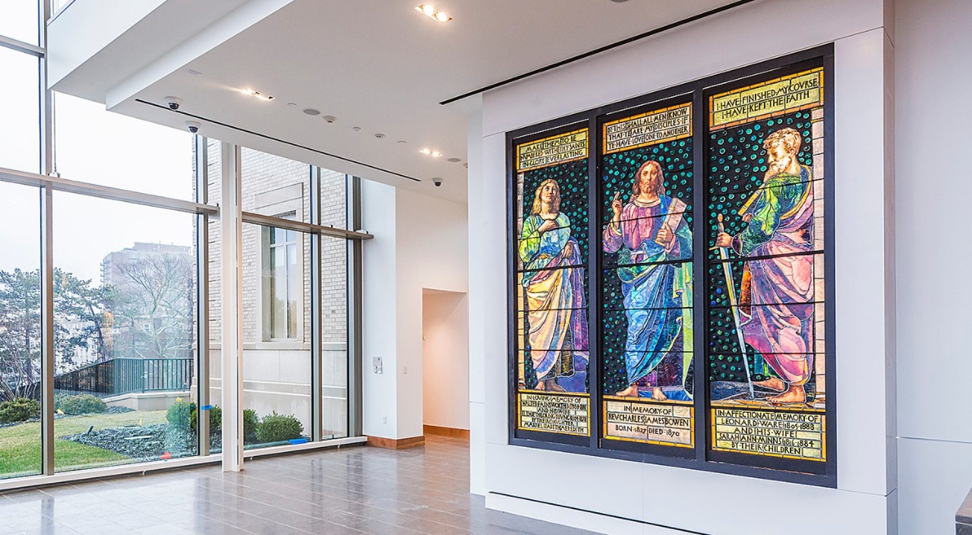 An eight-foot-tall stained-glass triptych by American artist John La Farge is the first piece to settle into the McMullen Museum of Art’s new home