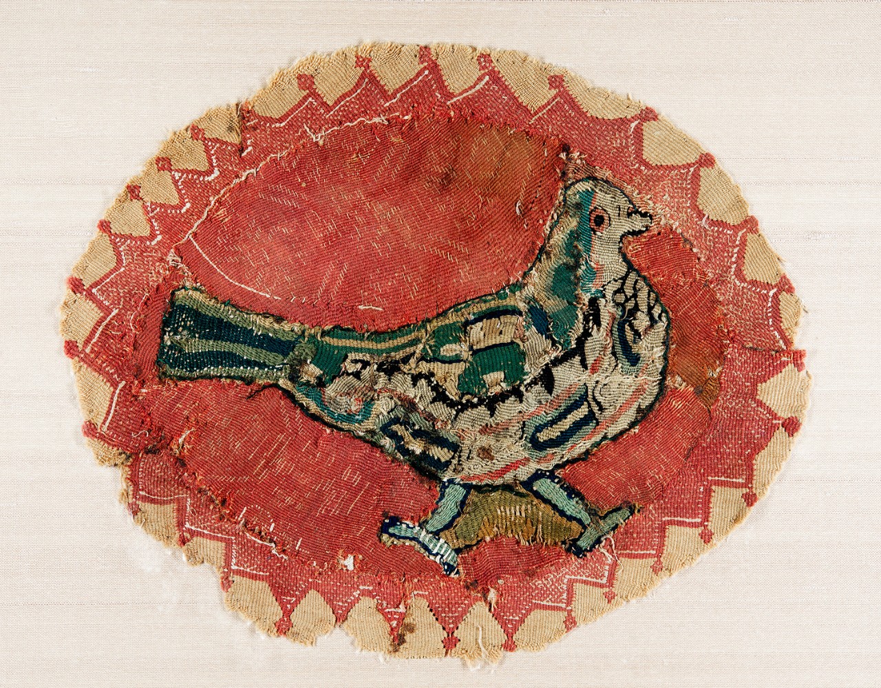 Textile roundel with dove Egypt, 5th–6th century CE wool on linen, 9 x 10.8 in.  