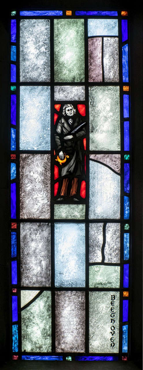 A depiction of Beethoven in stained glass by in Gargan Hall of BC's Bapst Library.
