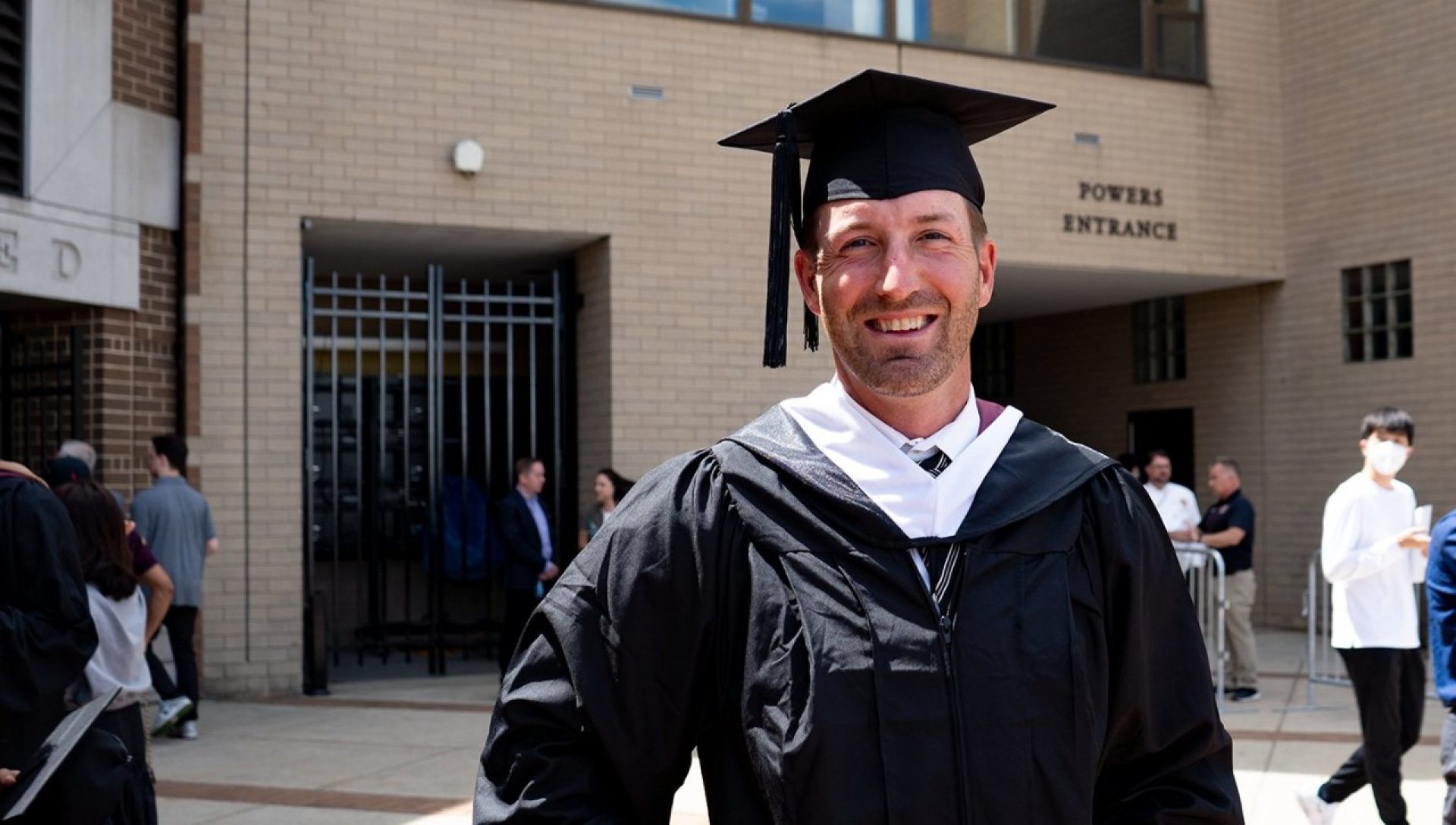 Brooks Orpik wearing a graduation cap and gown