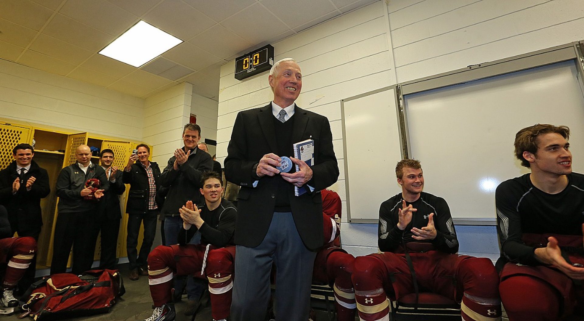 Jerry York with NCAA trophy