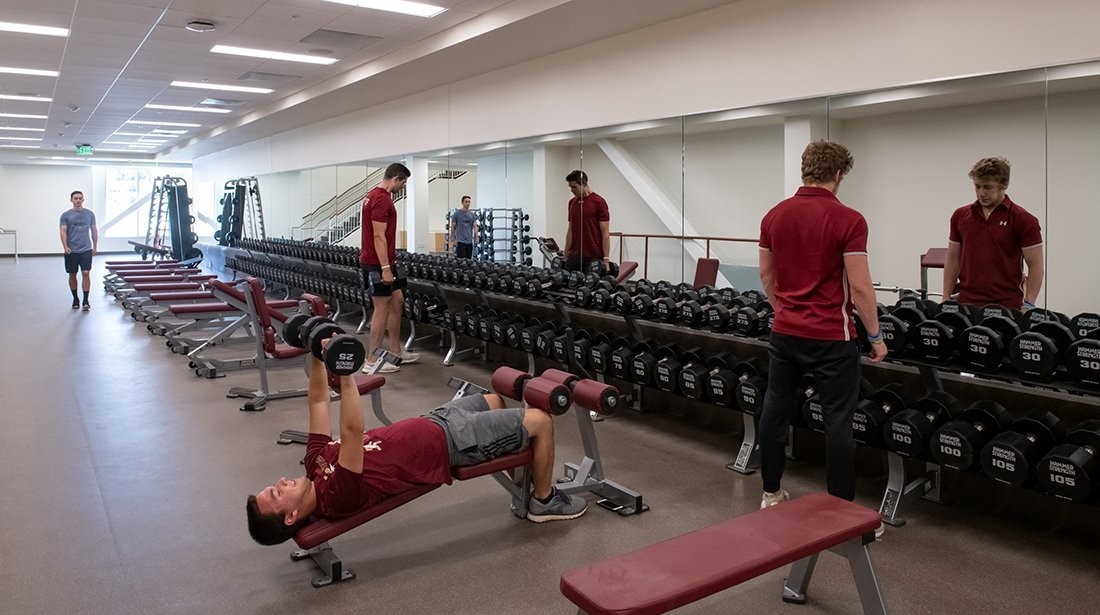 Students using free weights