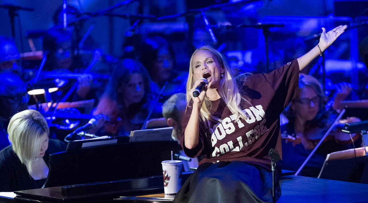 Kristin Chenoweth performs, clad in a Boston College shirt, at Pops on the Heights