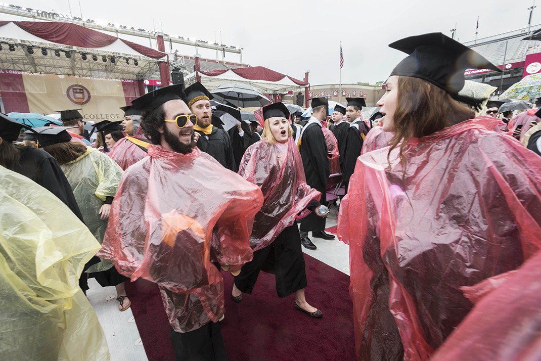 Graduates in rain ponchos
