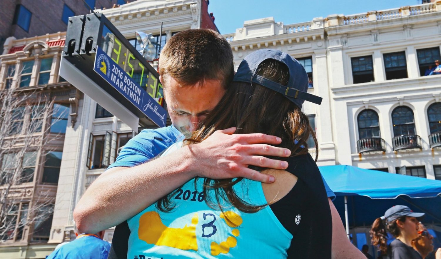 Patrick Downes and Jess Kensky after Patrick finishes the 2016 Boston Marathon
