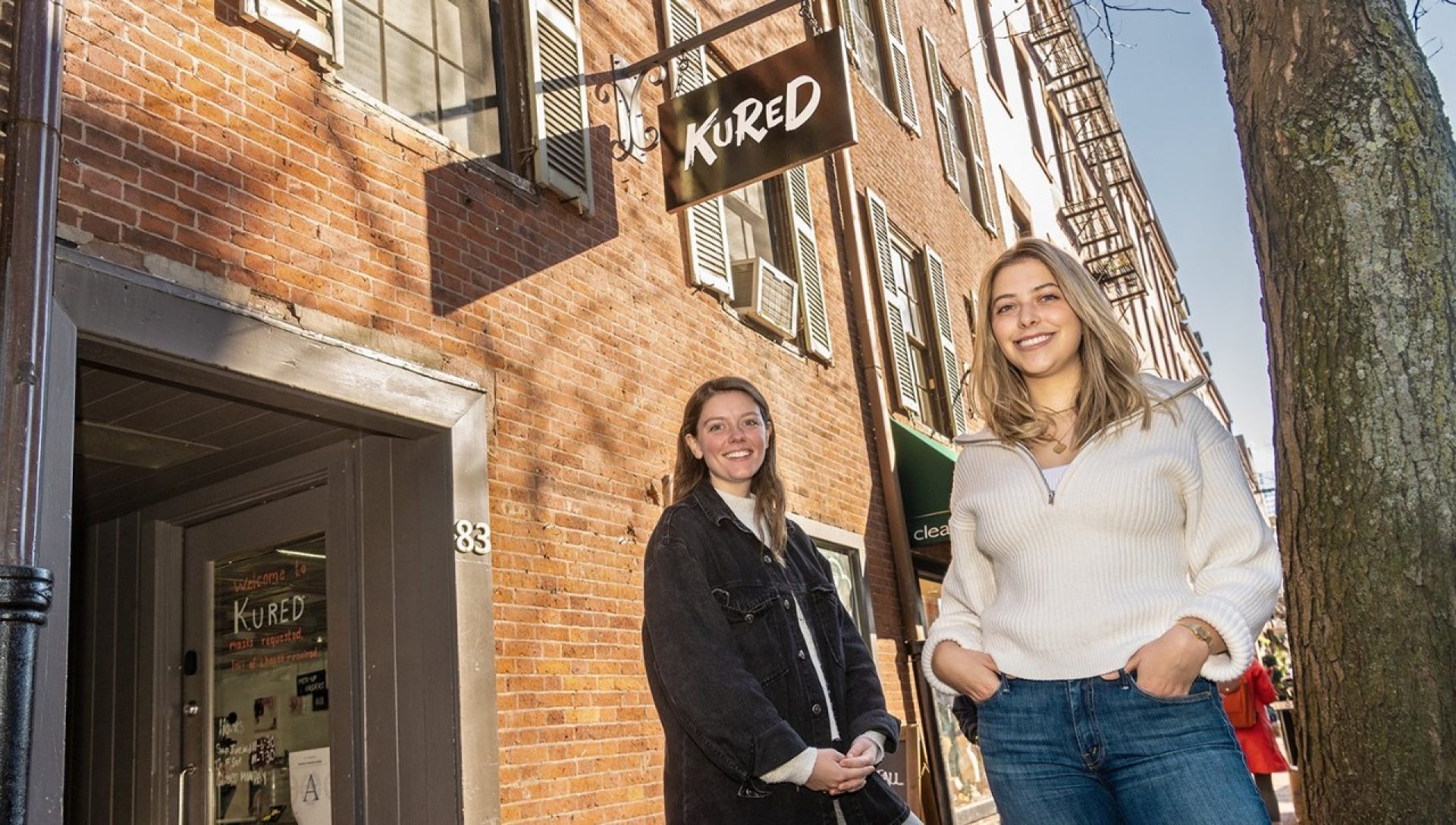 Kured founders inside their store