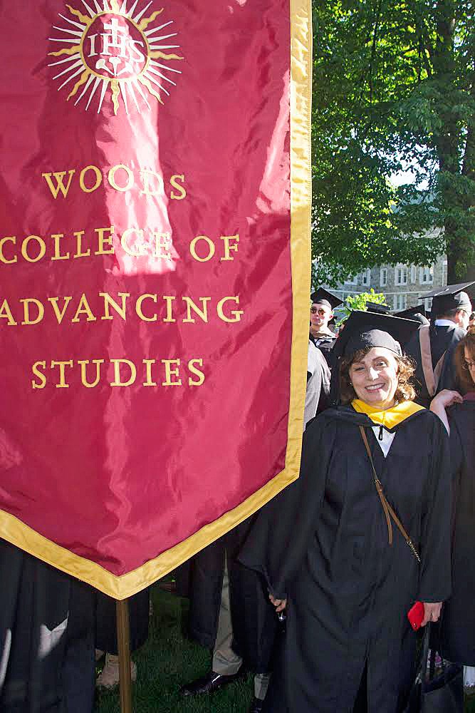 Hamideh-Anssari Hamideh Anssari wearing a graduation cap and gown