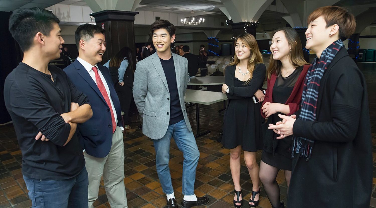 Eric Nam with Korean Students Association co-presidents Yerim Jee '17 of the Morrissey College of Arts and Sciences and classmate Margaret Chang of the Lynch School of Education, and Carroll School of Management junior Hyunsoo Jason Kim, president of KISO, the Korean International Students Organization.