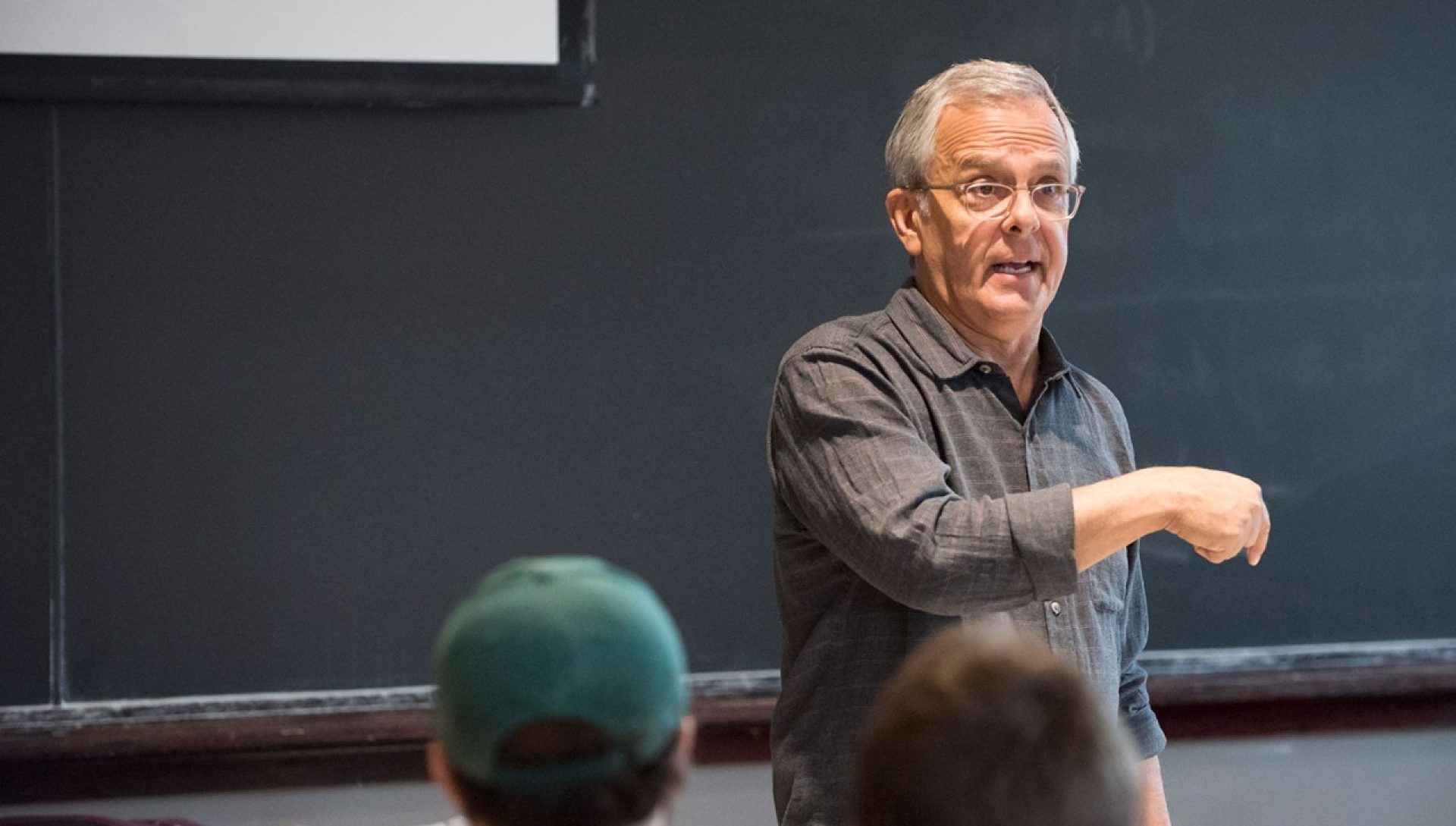 Mike Lupica visited with staff members of The Heights