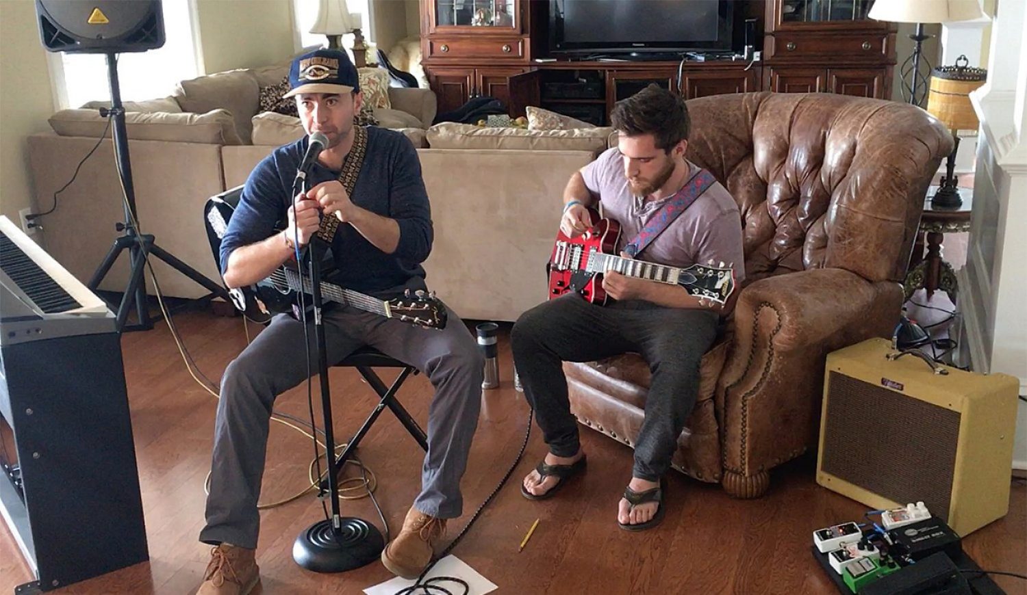 Nickolas Diamondidis playing guitar with Bobby Sacker