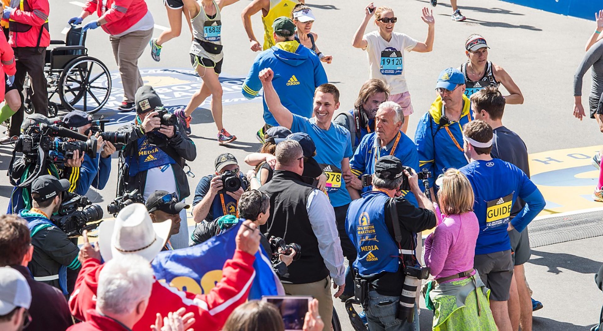 Patrick Downes '05 at the finish line of the 2016 Boston Marathon