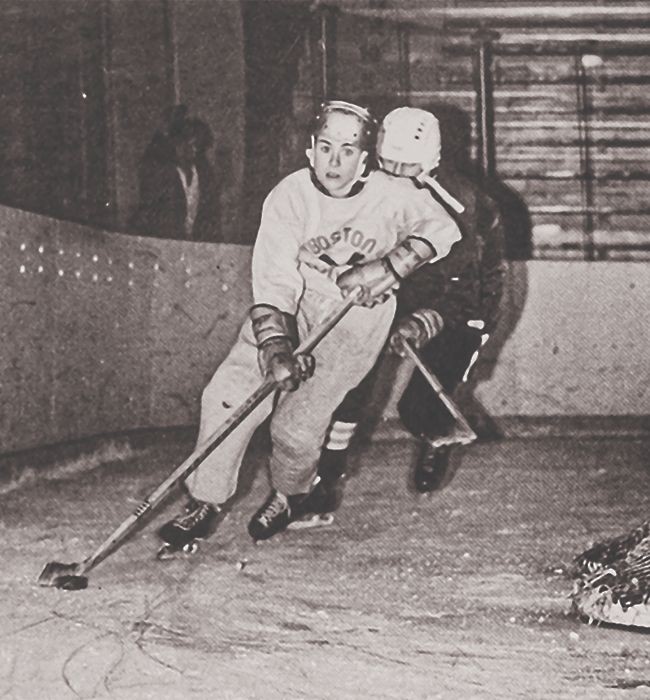 Player skates behind net