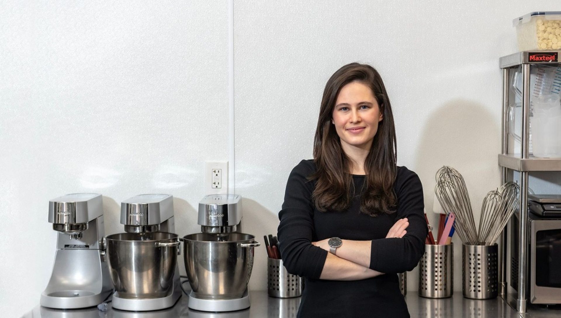 Ilona Znakharchuk standing in a kitchen