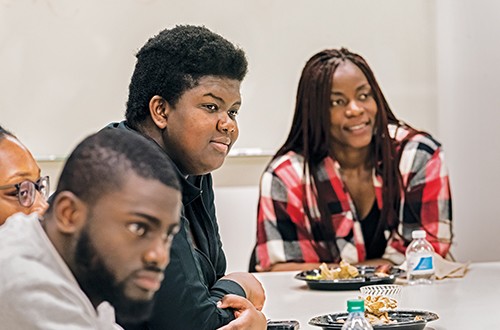 Kofi Agyeman ’21, Gabby Epemolu ’18 (obscured), Natasha Boateng-Wilson ’19, and Ella Awobajo ’18