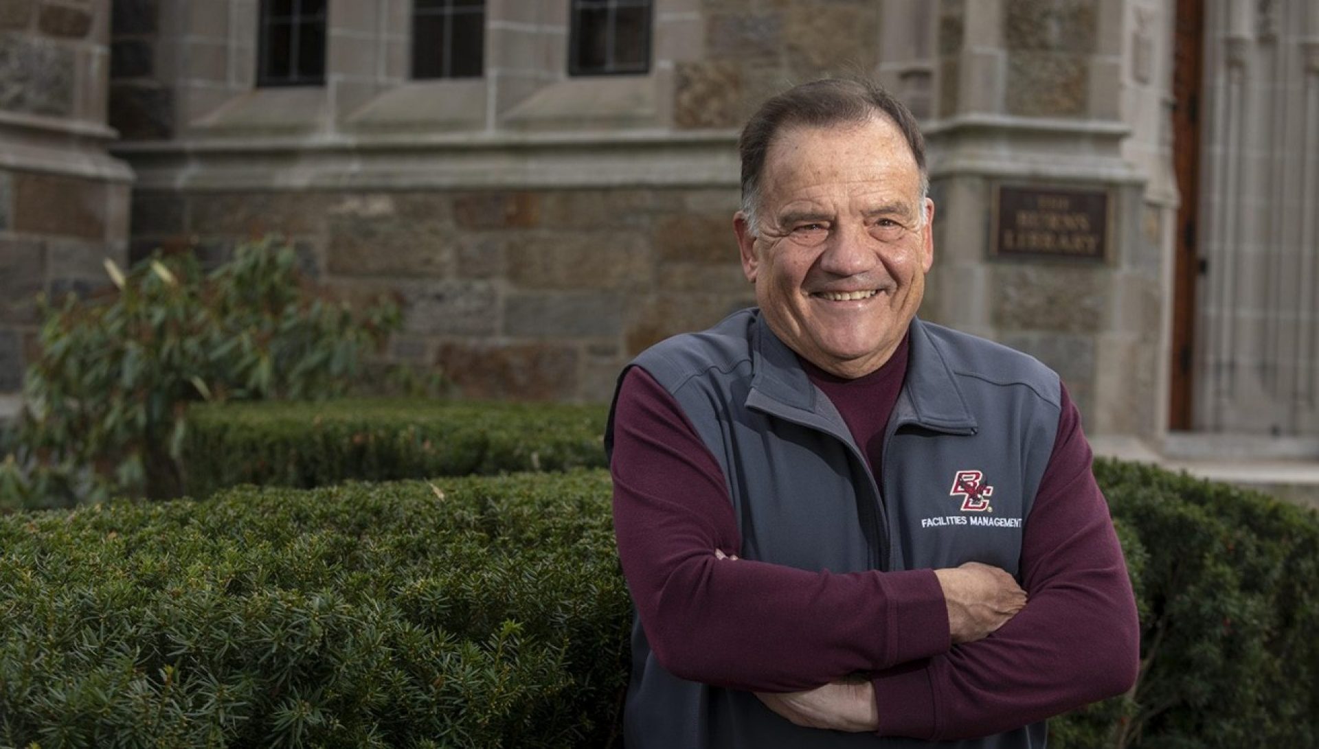 Al Travaglini standing on campus