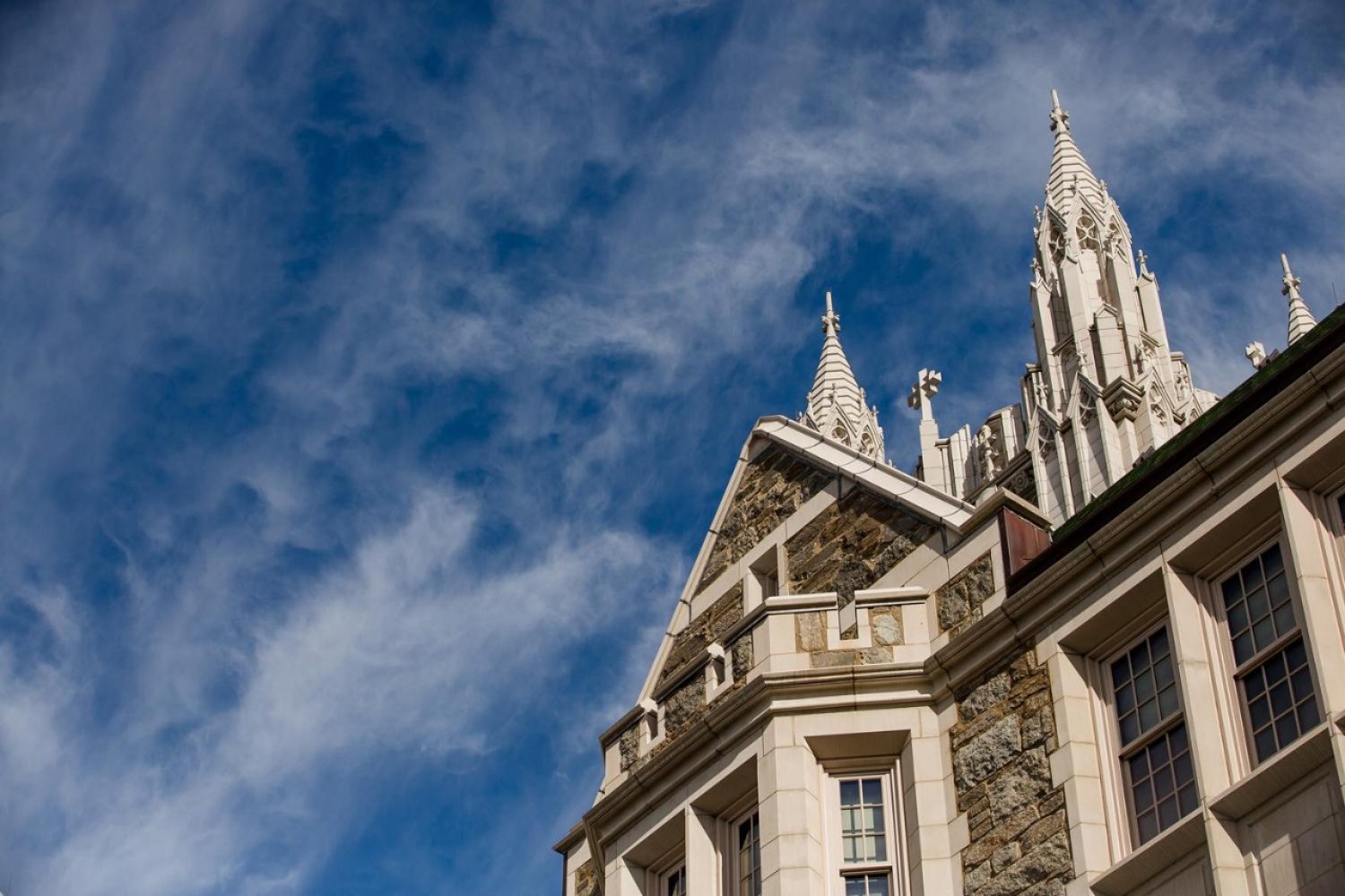 Gasson Hall tower against blue sky