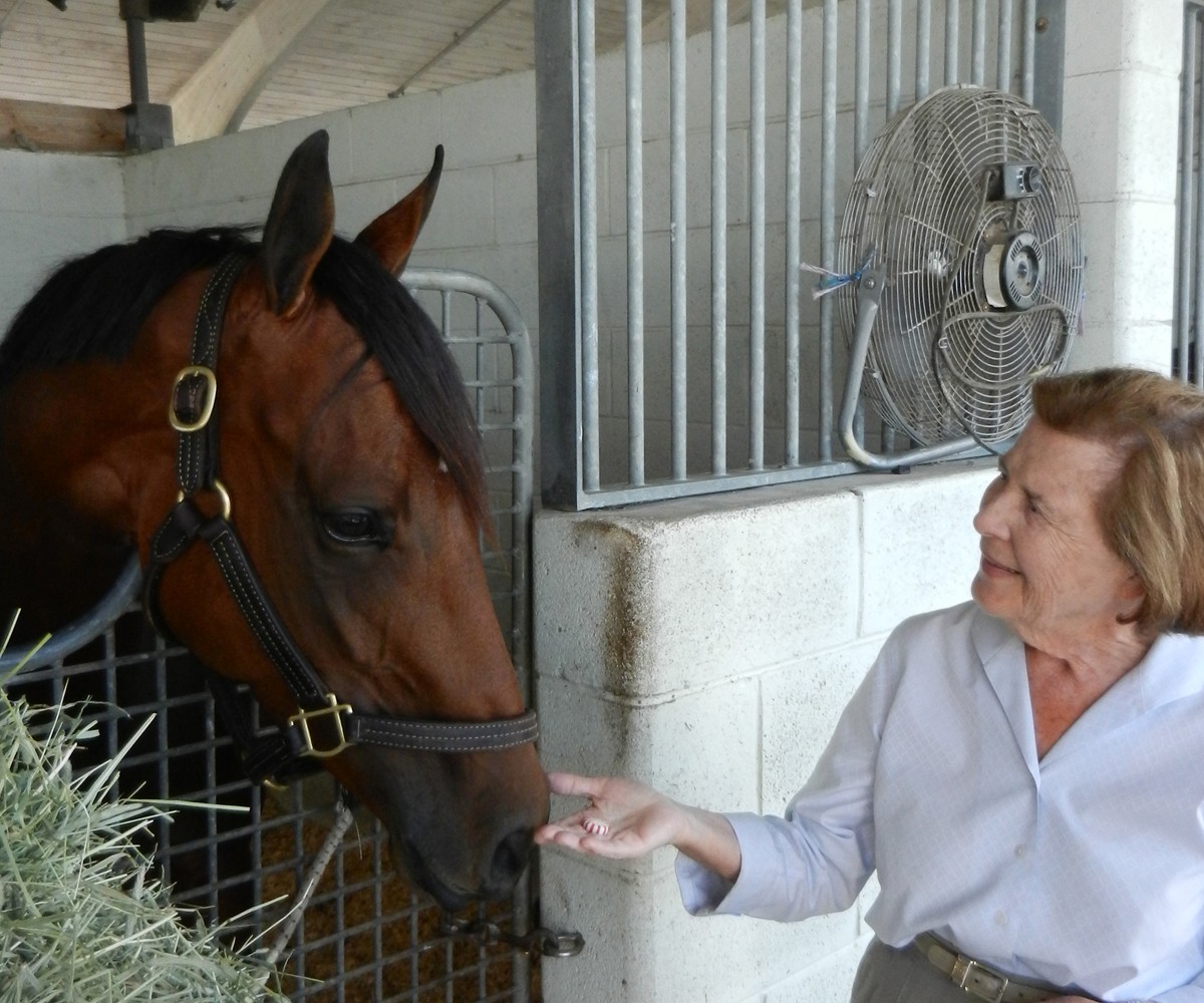 Joyce Robsham 2 Mrs. Robsham with one of her beloved horses.