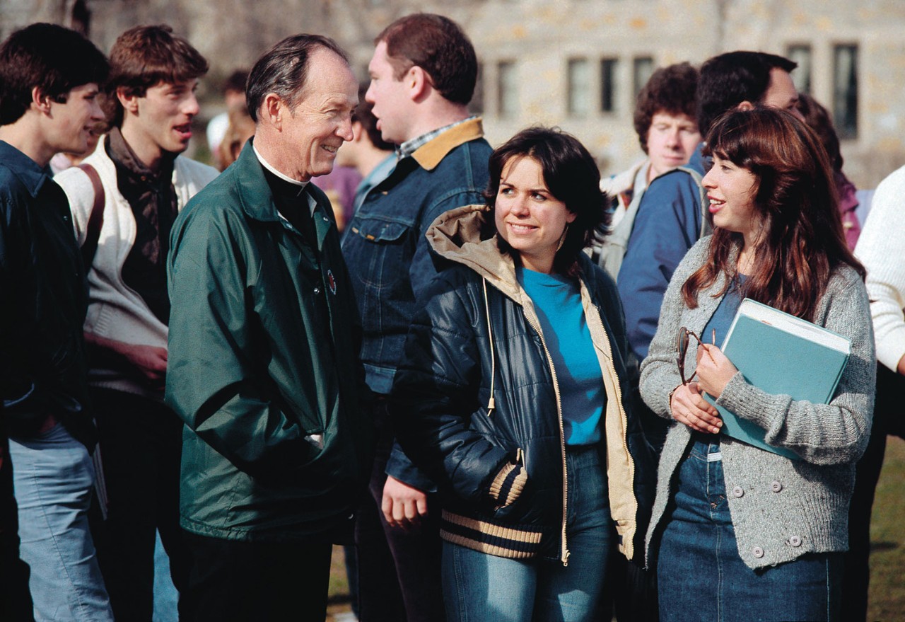 J. Donald Monan, S.J., with students on the BC campus