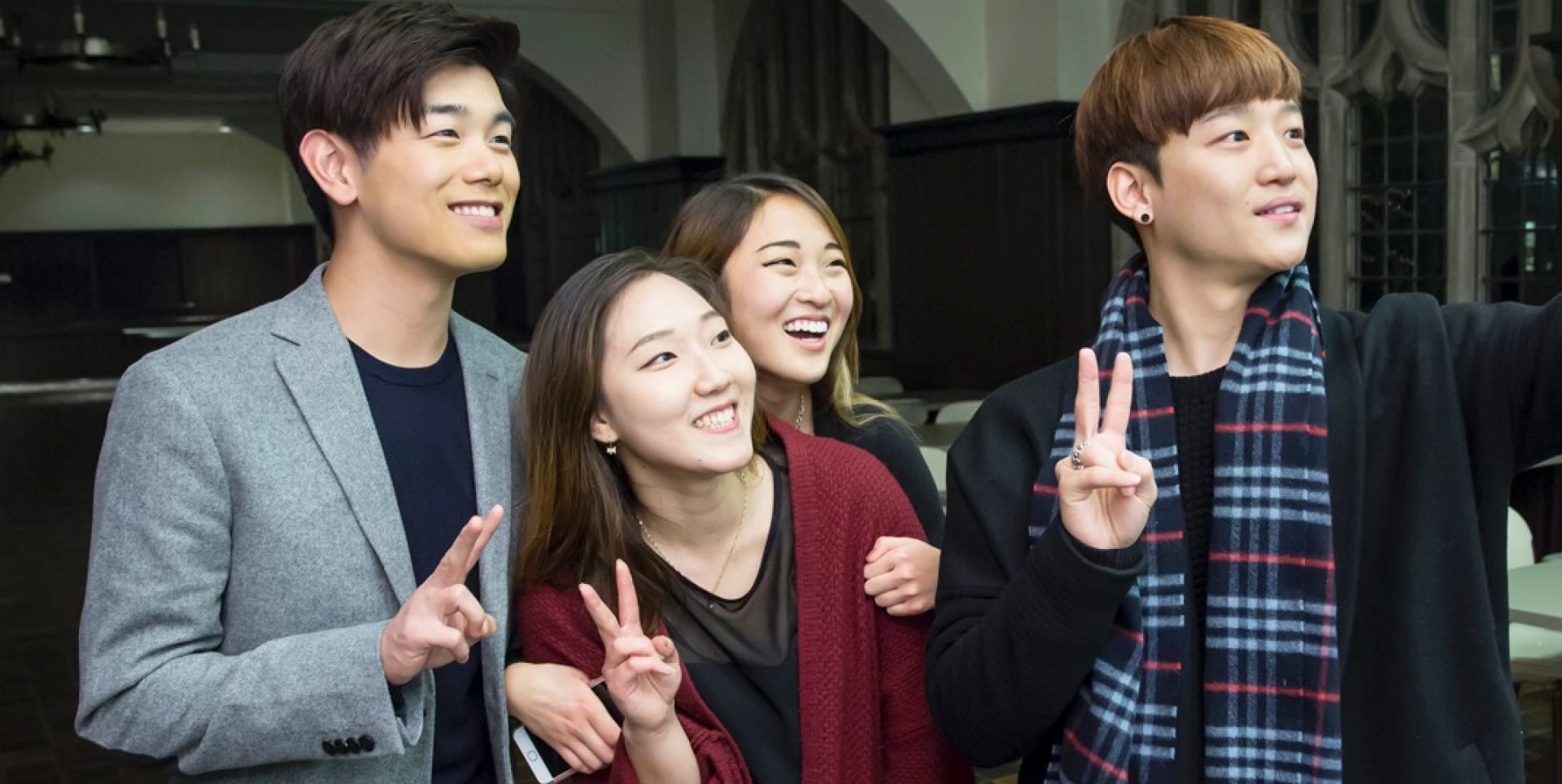 Eric Nam with Korean Students Association co-presidents Yerim Jee '17 of the Morrissey College of Arts and Sciences and classmate Margaret Chang of the Lynch School of Education, and Carroll School of Management junior Hyunsoo Jason Kim, president of KISO, the Korean International Students Organization.