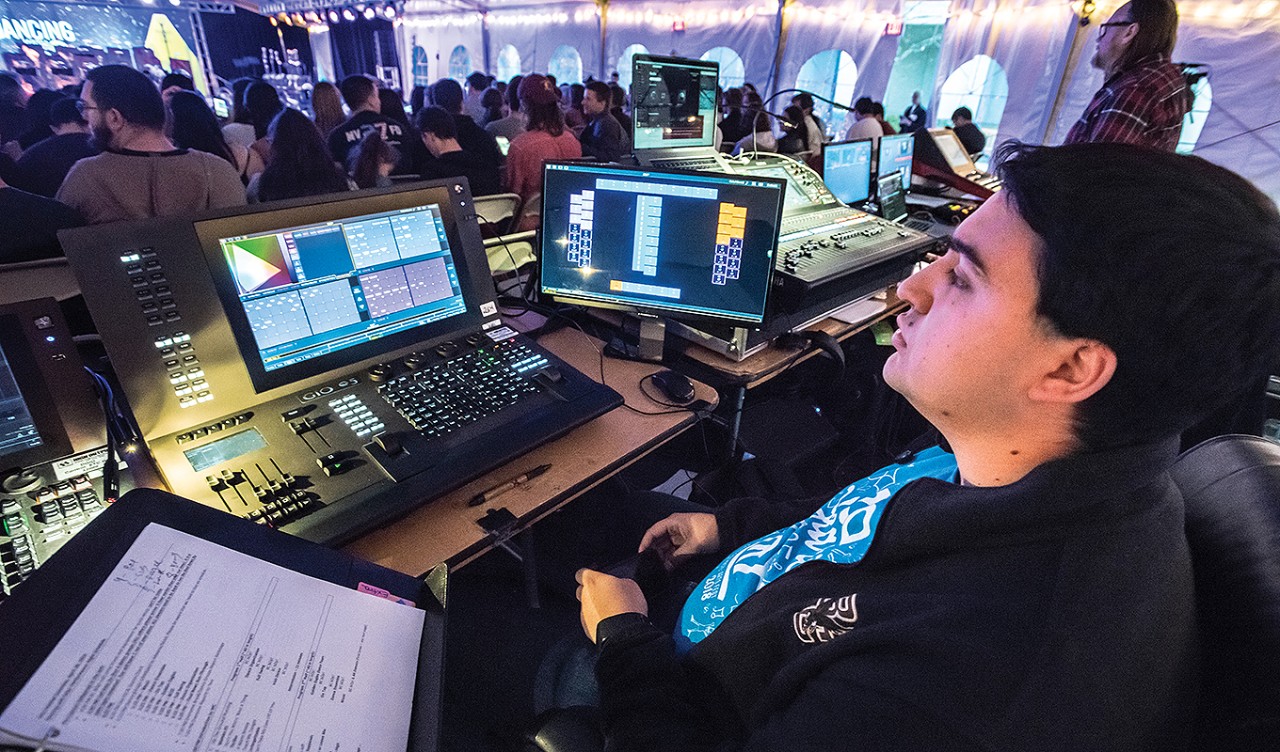 Biondolillo controls the lights during Arts Fest’s Thursday night Dancing with bOp! performance in the O’Neill Plaza tent.