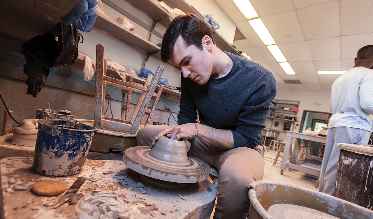 Andrew Goodwin at pottery wheel
