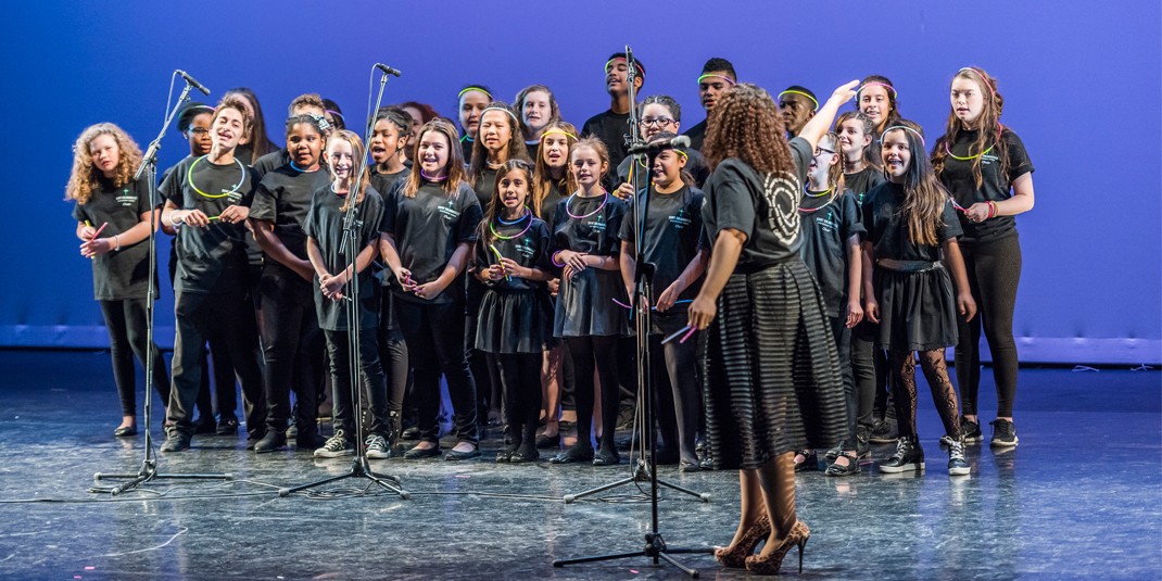 The 13th annual Sing It to the Heights music competition took place on March 2 in Robsham Theater, organized by BC’s Emerging Leader Program in partnership with the University to raise funds for St. Columbkille Partnership School in Brighton. This year’s event raised $6,300. Proceeds from Sing it to the Heights have enabled St. Columbkille to establish its own music program. Freshman Tonye Ikoli won the competition, one of 20 BC students to participate; St. Columbkille students also performed at the event. (Photo by Yiting Chen)