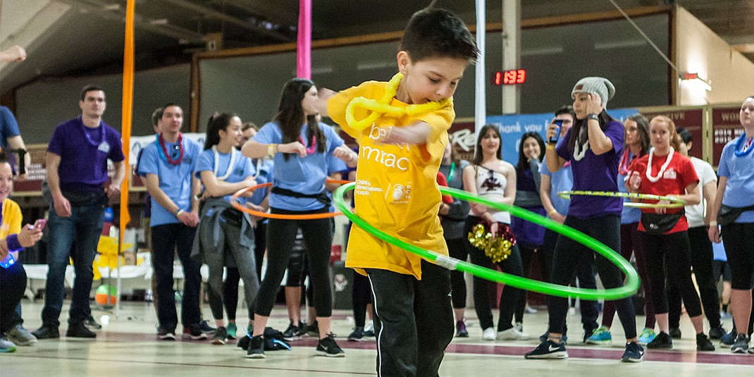 Students, along with some special guests, danced and engaged in other activities for 12 hours in the Flynn Recreation Complex at the Boston College Dance Marathon. Fundraising from the event went to support Boston Children’s Hospital. (Photo by Julia Hopkins)