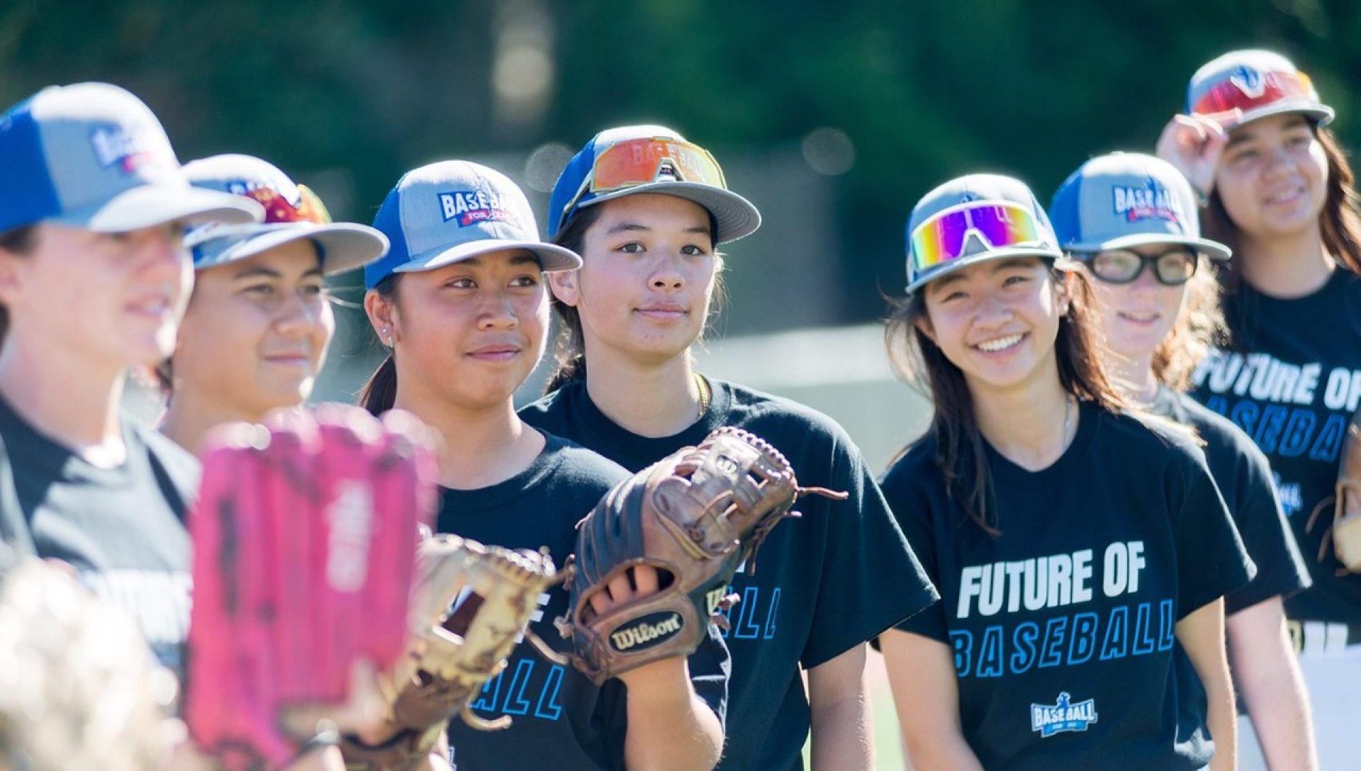 A group of female baseball players