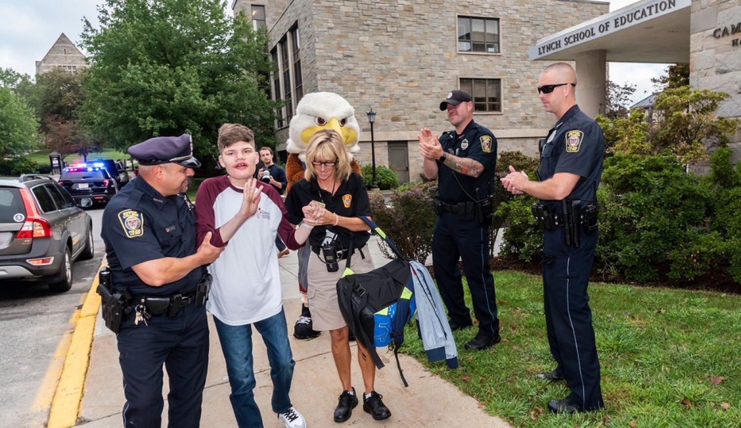 BCPD officers with a Campus School student
