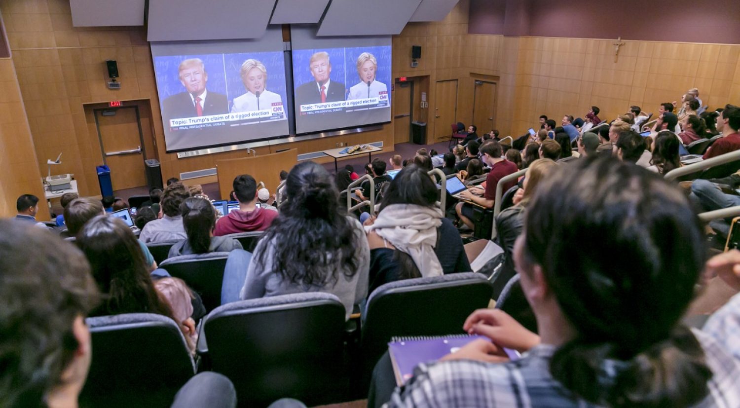 Students watching debate
