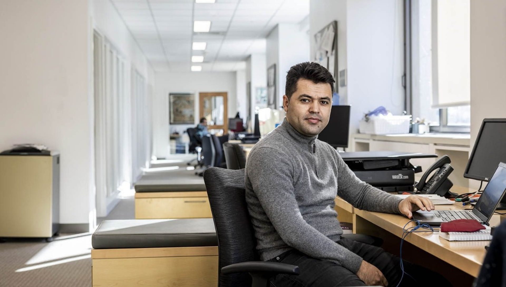 A man sitting at a desk