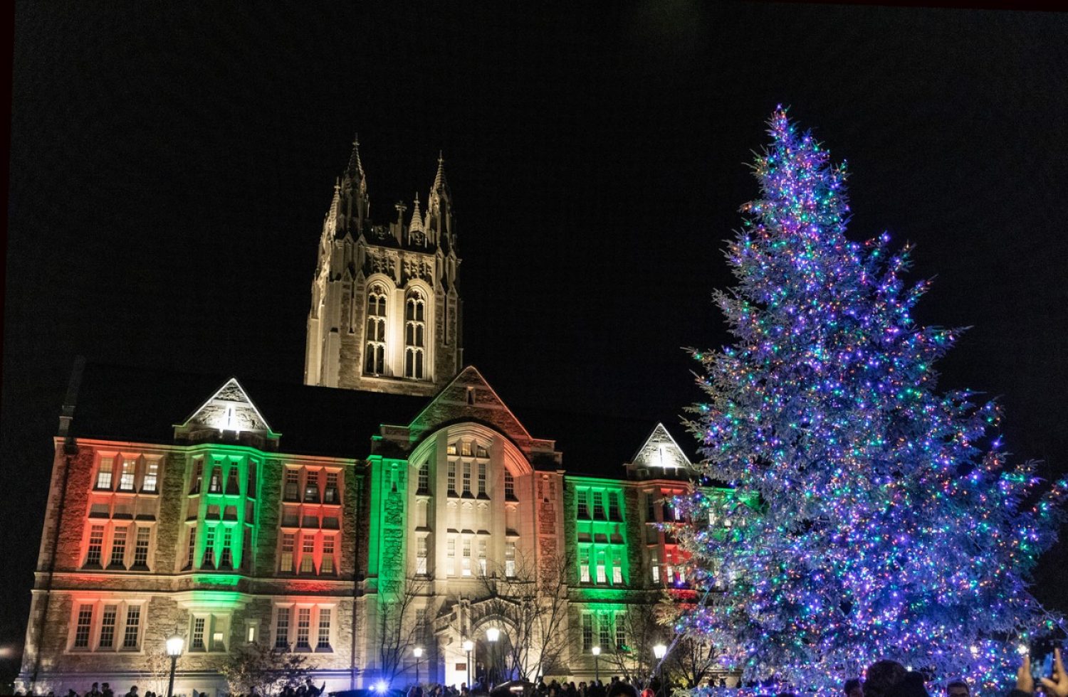 Gasson Hall and trees with holiday lights